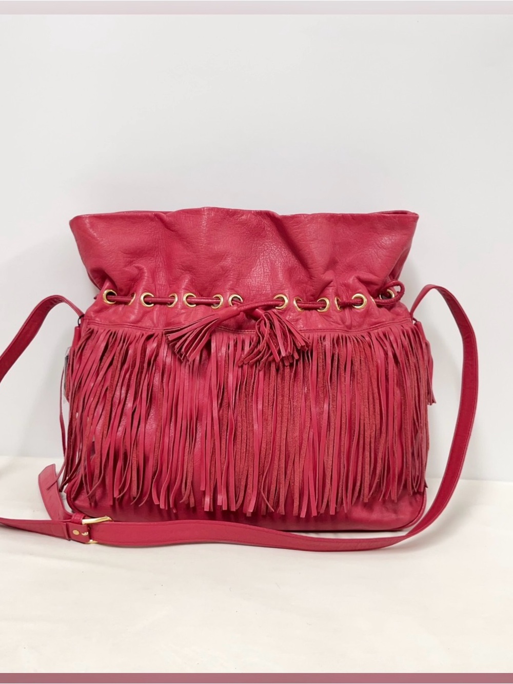 Yves Saint Laurent Pink Leather Fringe Drawstring Crossbody
